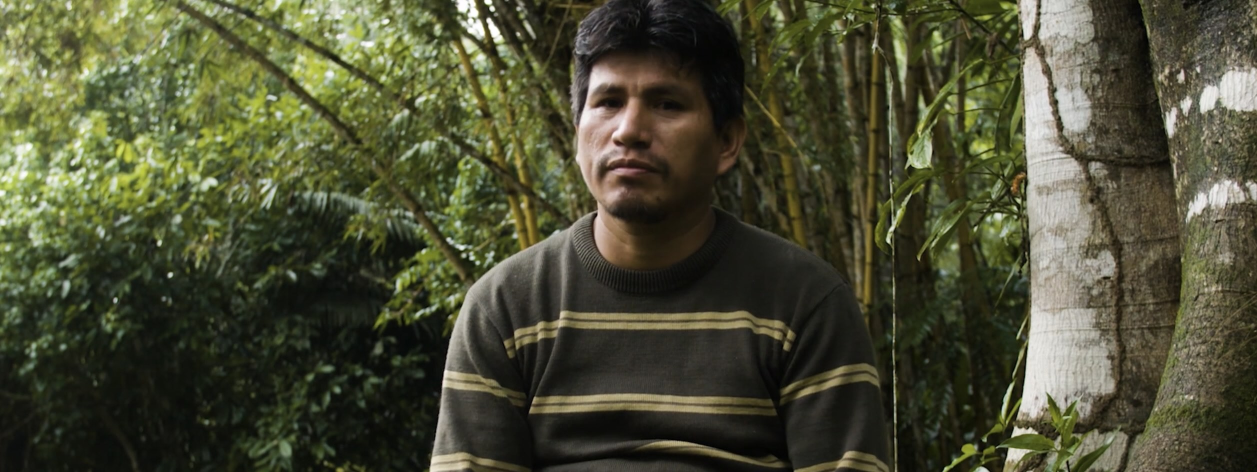 picture of a peruvian man in the amazon jungle.jpg